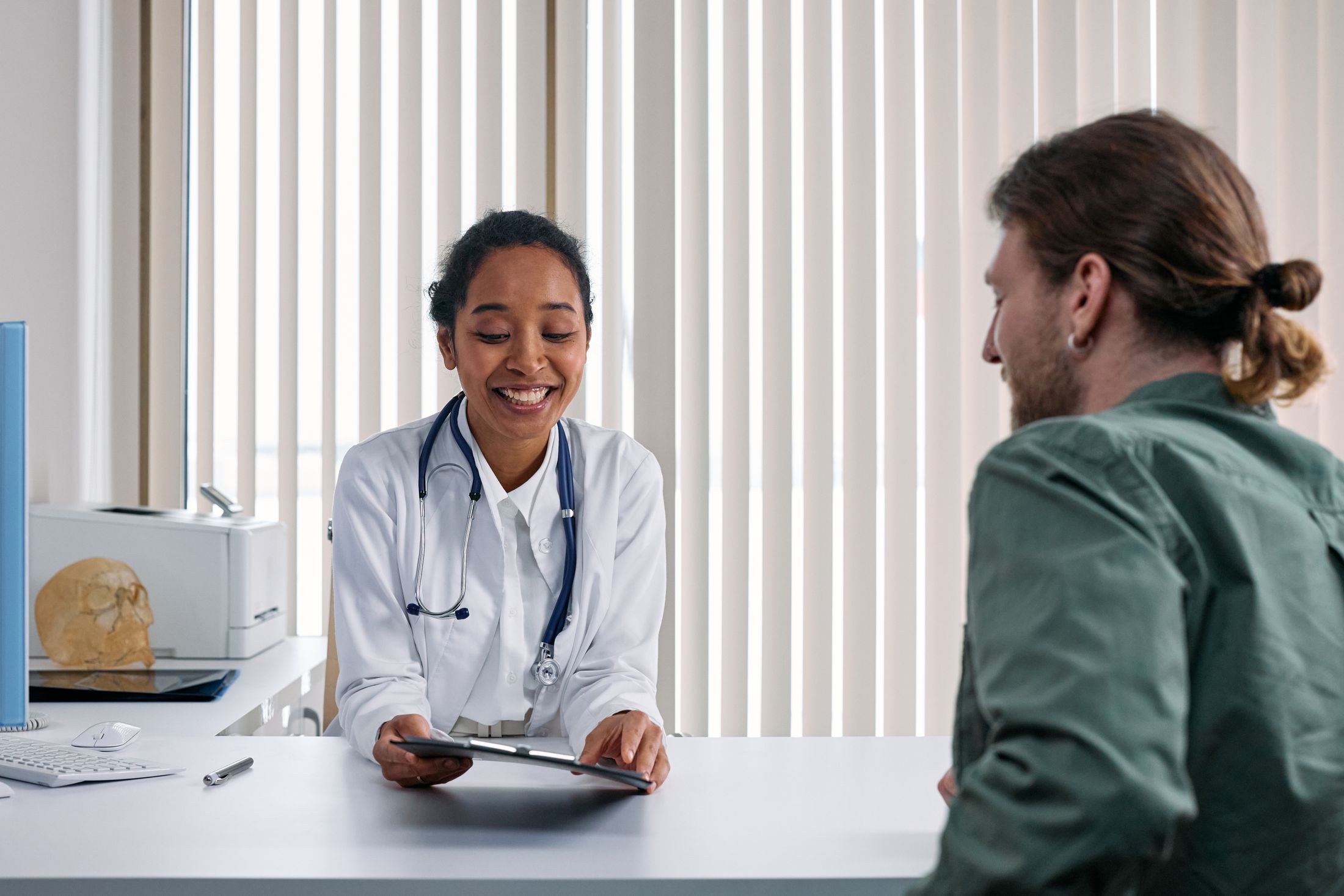 A Magnet doctor in a warm consultation with a patient