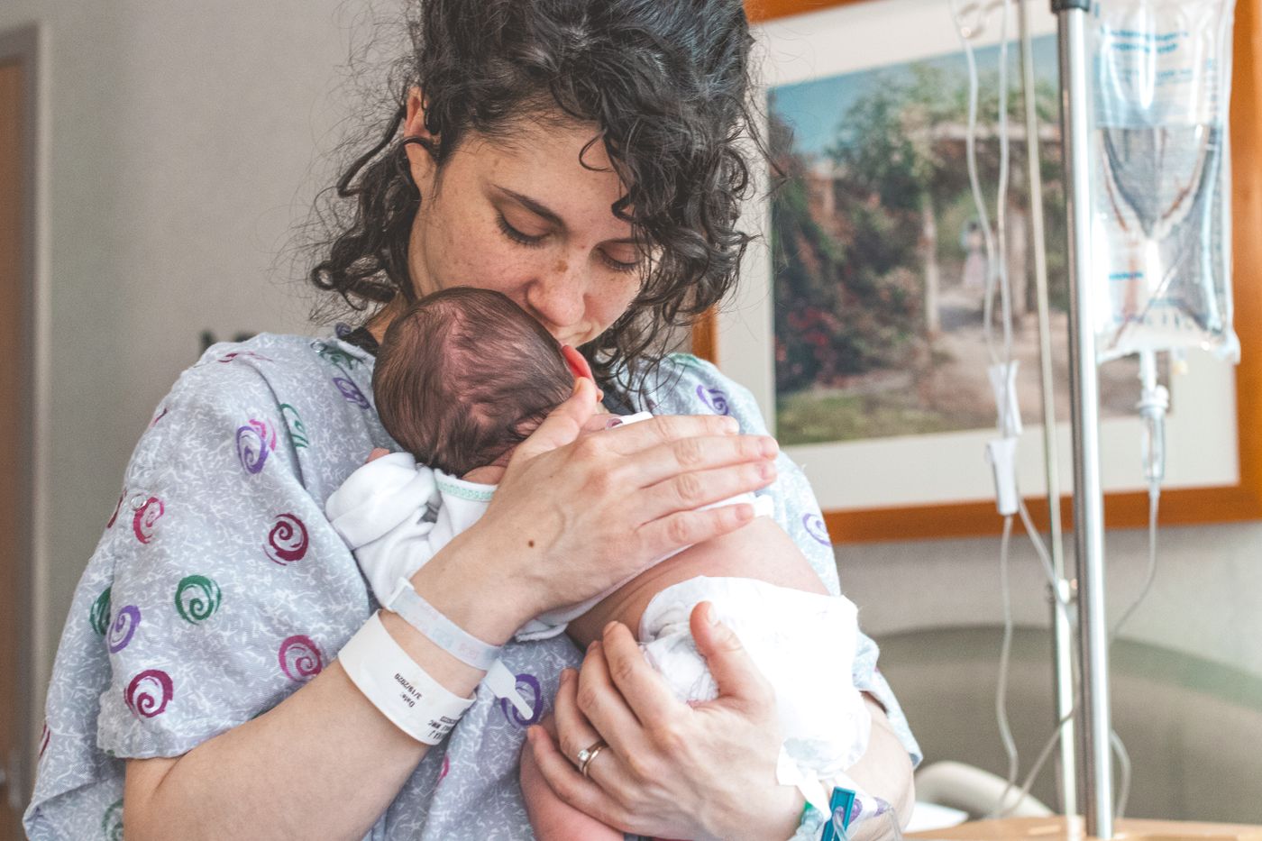 A mother holding her newborn