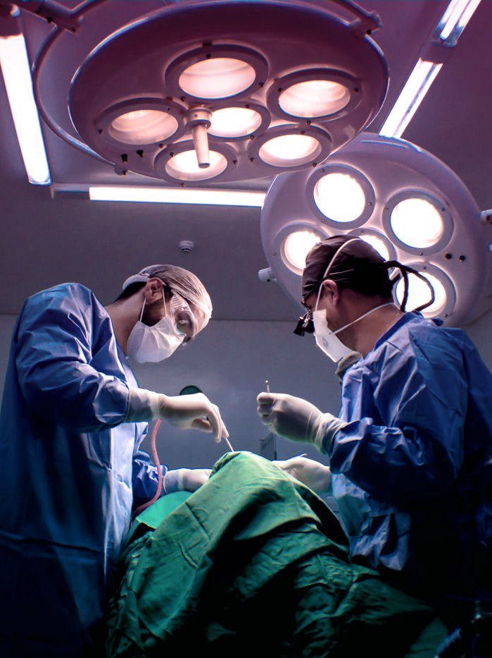 Surgeons in a modern operating theatre